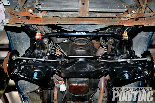 23. After the driver’s side was disassembled and then reassembled, the new Gen II sway bar was lifted up and bolted in. Note that the front sway bar is non-adjustable.